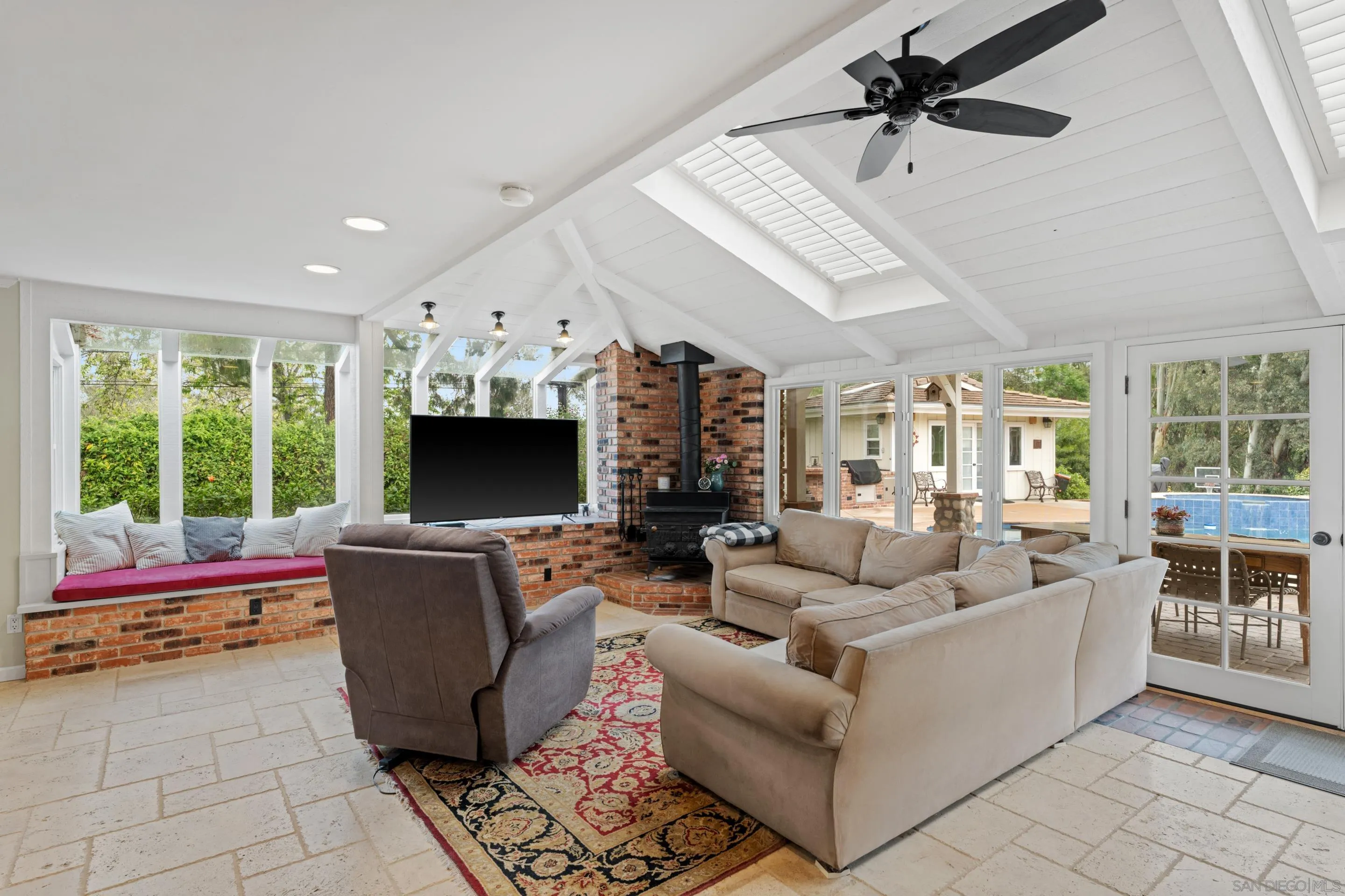 16327 Woodson View Road Poway, CA 92064 - Photo 17 of 54 a living room with furniture and a flat screen tv