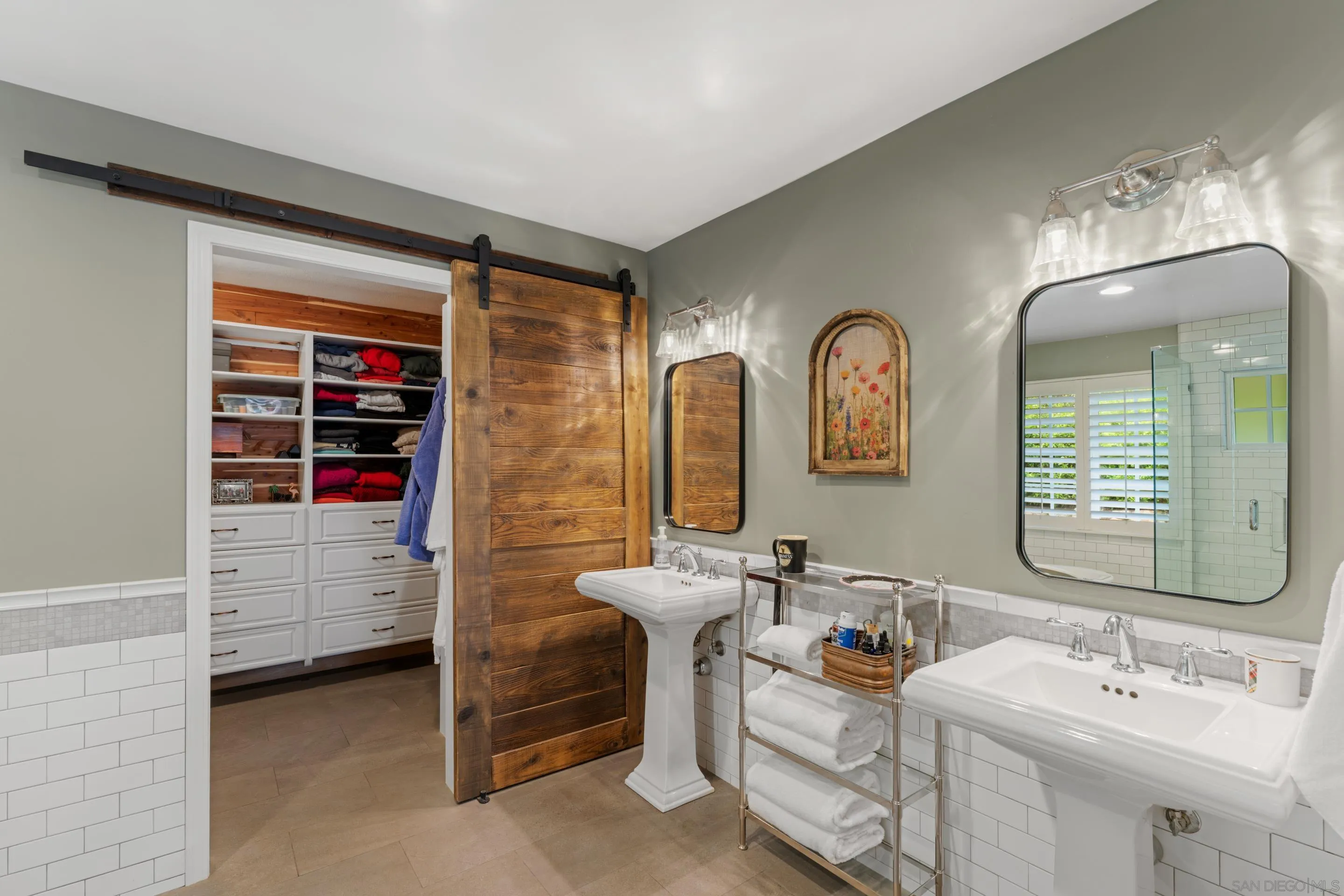 16327 Woodson View Road Poway, CA 92064 - Photo 38 of 54 a bathroom with a sink a toilet and a mirror