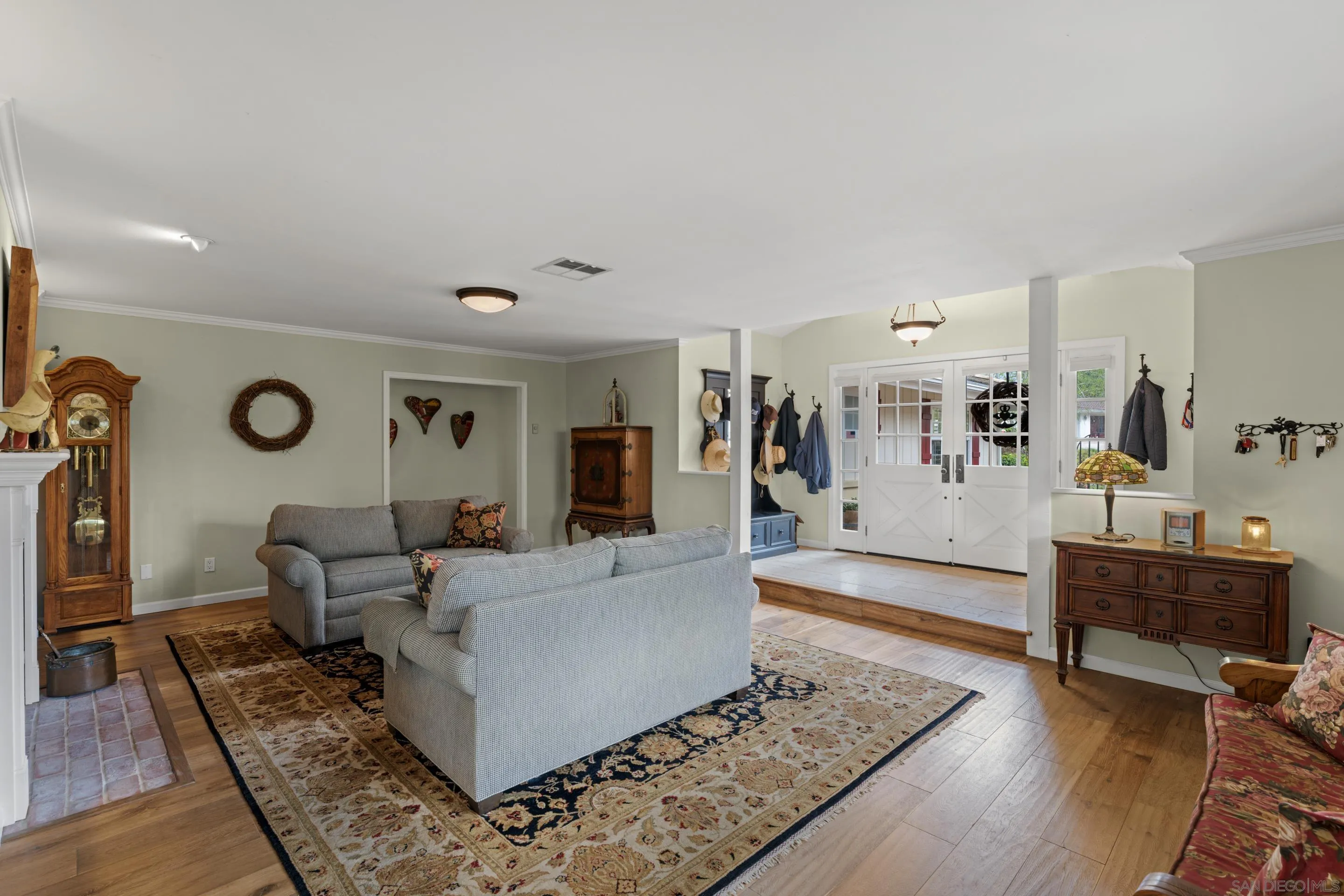 16327 Woodson View Road Poway, CA 92064 - Photo 5 of 54 a living room with furniture and wooden floor