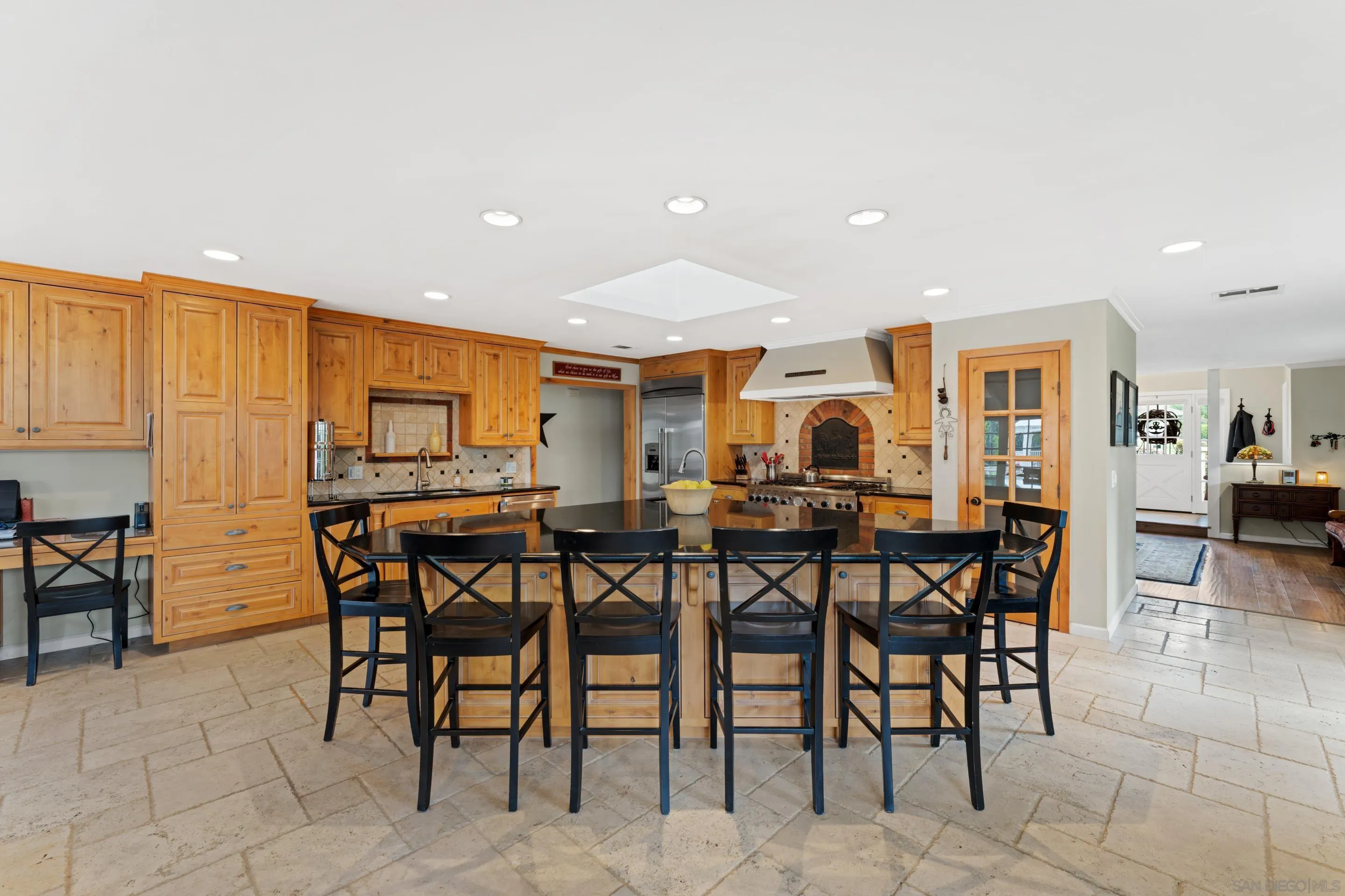 16327 Woodson View Road Poway, CA 92064 - Photo 9 of 54 a view of a dining room with furniture