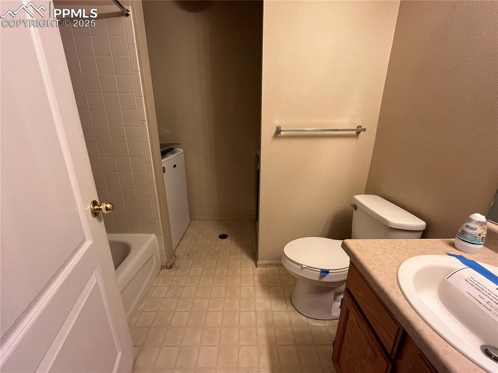718 Mediterranean Point Colorado Springs, CO 80910 - Photo 19 of 28 a bathroom with a sink and toilet