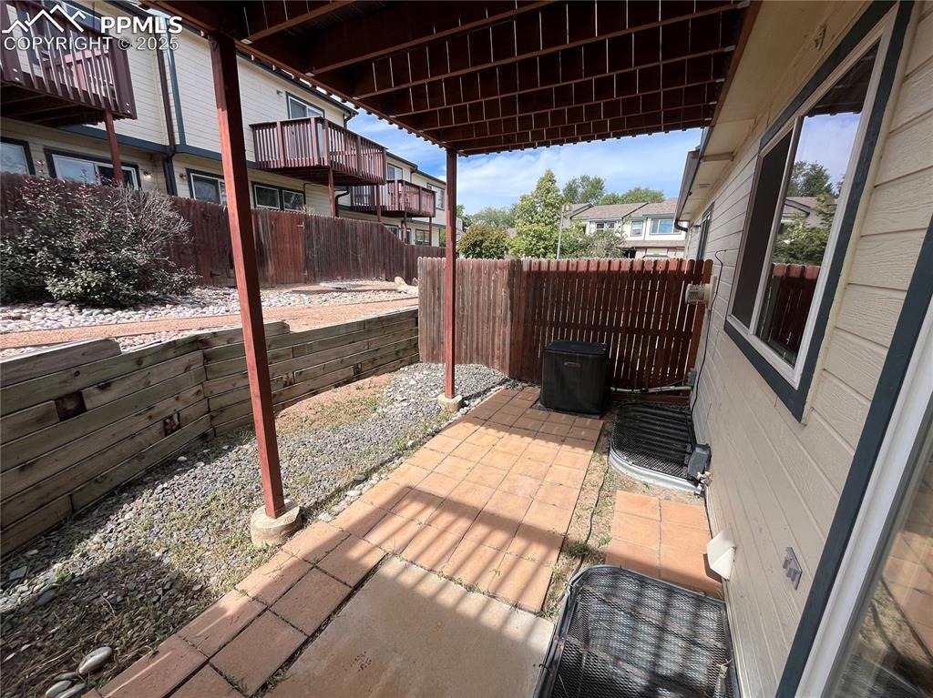 718 Mediterranean Point Colorado Springs, CO 80910 - Photo 25 of 28 a view of balcony with a patio