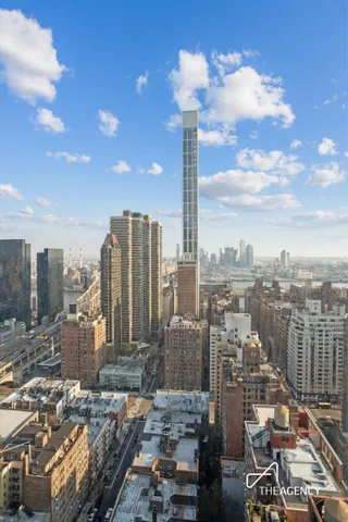 a view of a balcony with city view