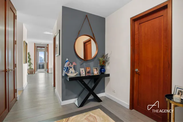 a living room with furniture and a gate