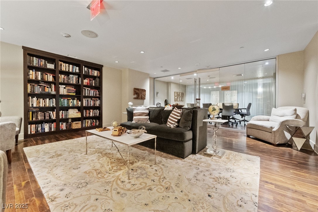 8255 South Las Vegas Boulevard, Unit 809 Las Vegas, NV 89123 - Photo 24 of 32 Living room with wood finished floors