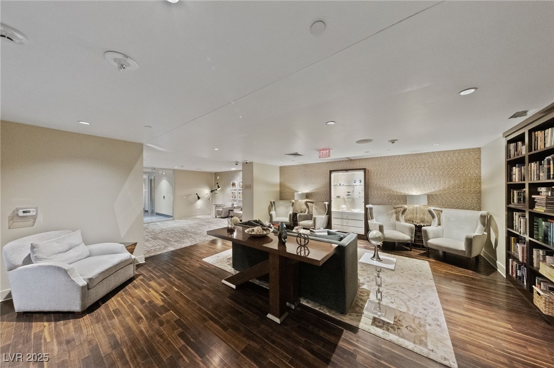 8255 South Las Vegas Boulevard, Unit 809 Las Vegas, NV 89123 - Photo 25 of 32 Living area with wood finished floors, wallpapered