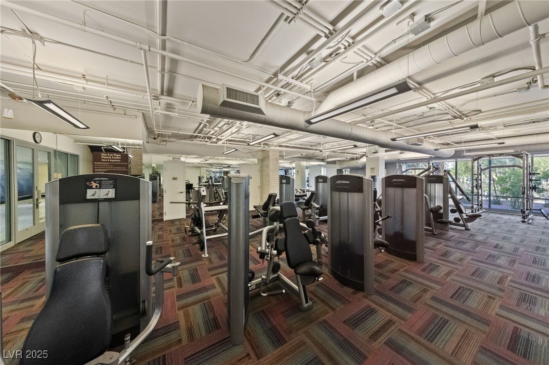 8255 South Las Vegas Boulevard, Unit 809 Las Vegas, NV 89123 - Photo 28 of 32 Workout area with dark carpet
