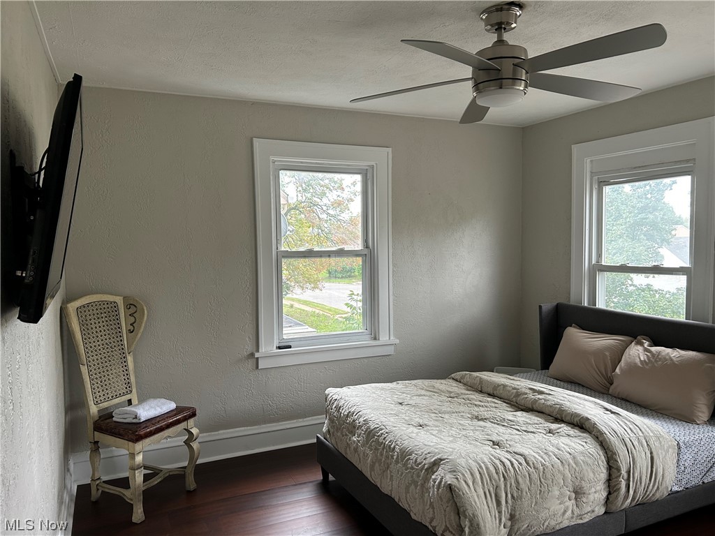 3089 Becket Road Cleveland, OH 44120 - Photo 10 of 16 Hardwood floor master bedroom with ceiling fan