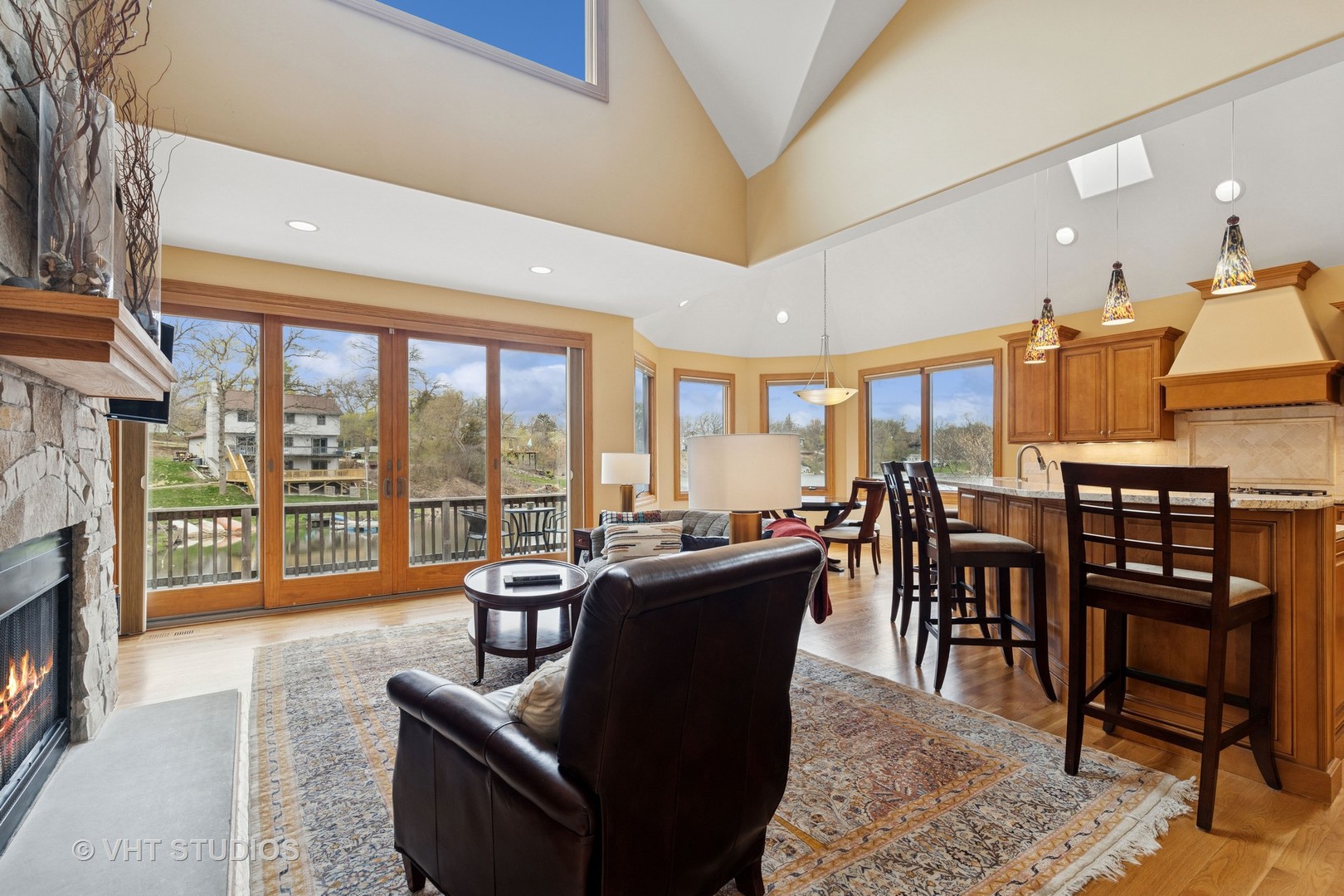 6107 Lake Shore Drive Cary, IL 60013 - Photo 12 of 40 a living room with fireplace furniture and a large window