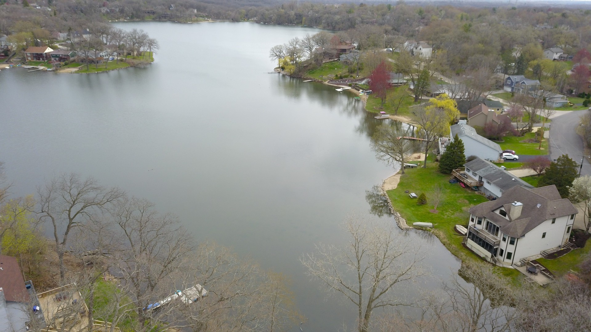 6107 Lake Shore Drive Cary, IL 60013 - Photo 3 of 40 a aerial view of a house with outdoor space and lake view