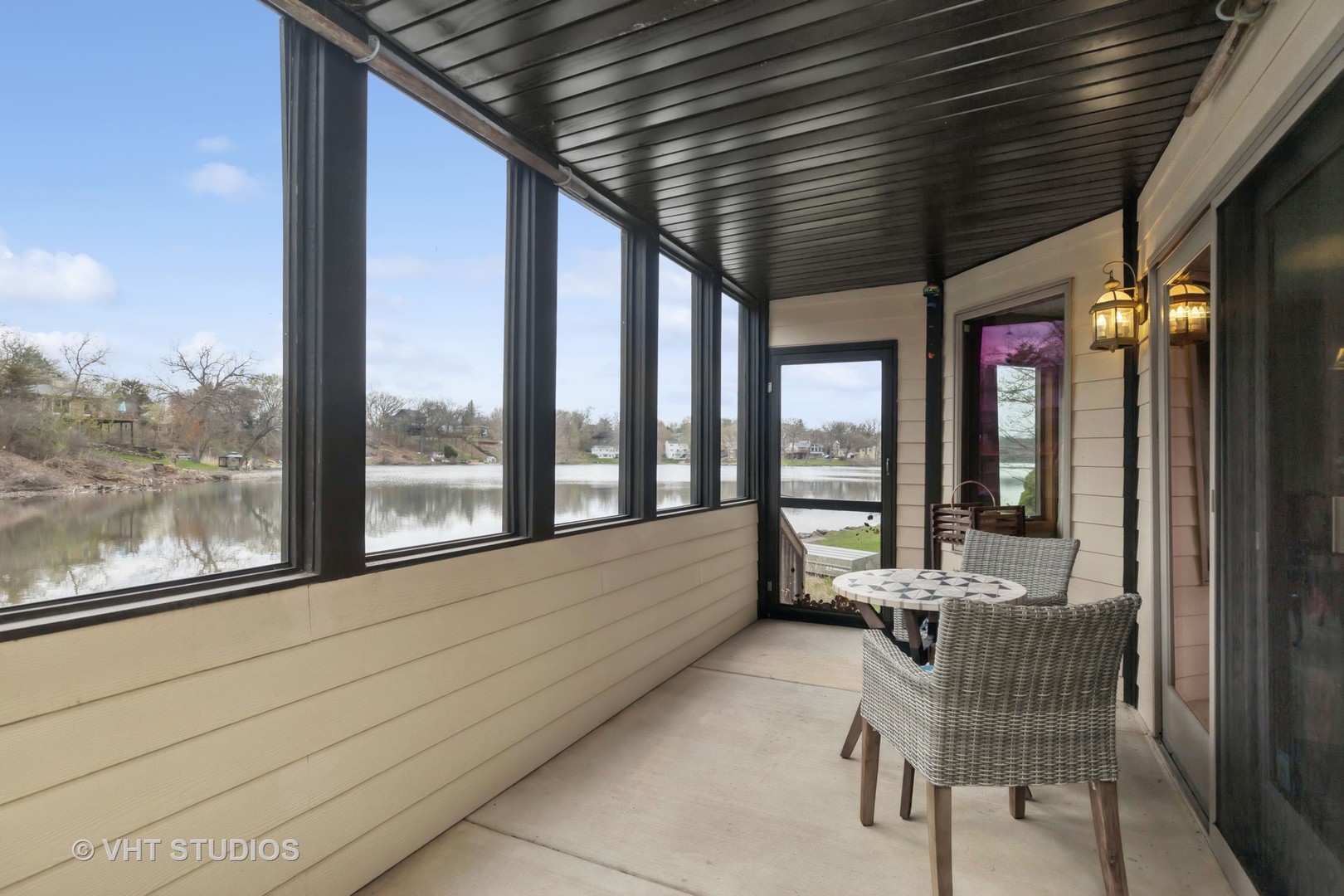 6107 Lake Shore Drive Cary, IL 60013 - Photo 36 of 40 a balcony with chairs
