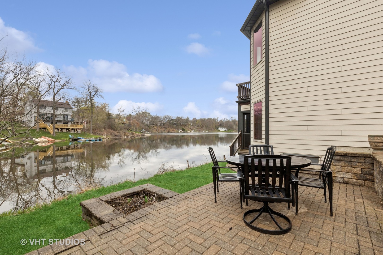 6107 Lake Shore Drive Cary, IL 60013 - Photo 7 of 40 a view of a lake with furniture