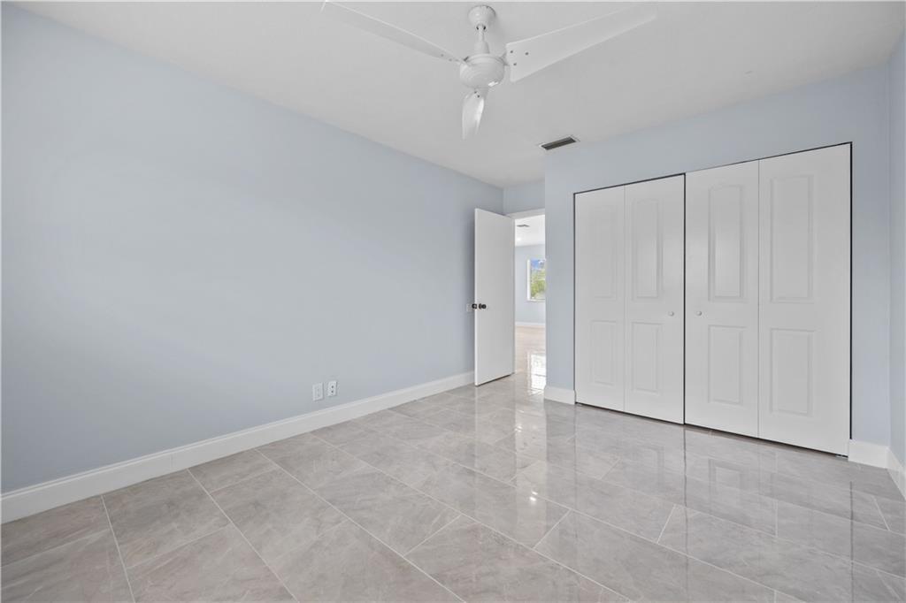 260 Northwest 19th Street, Unit 290 Boca Raton, FL 33432 - Photo 18 of 18 wooden floor in an empty room