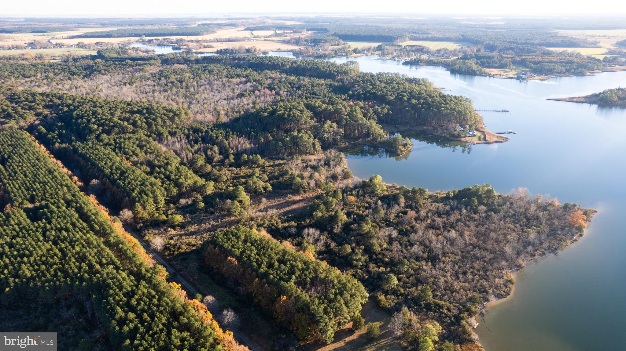 Gregory Road Cambridge, MD 21613 - Photo 12 of 27 a view of a lake with mountains in the background