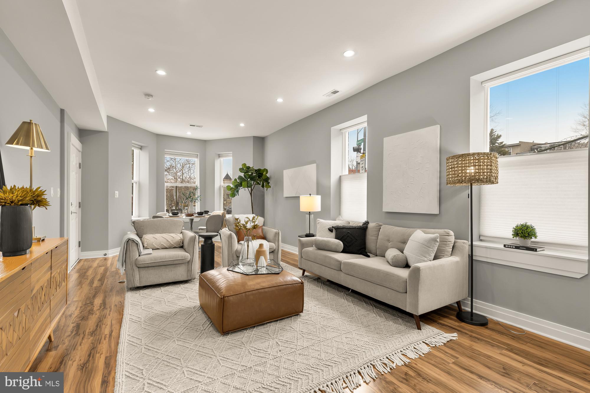 1719 Lincoln Road Northeast, Unit 1 Washington, DC 20002 - Photo 1 of 23 a living room with furniture and a couch
