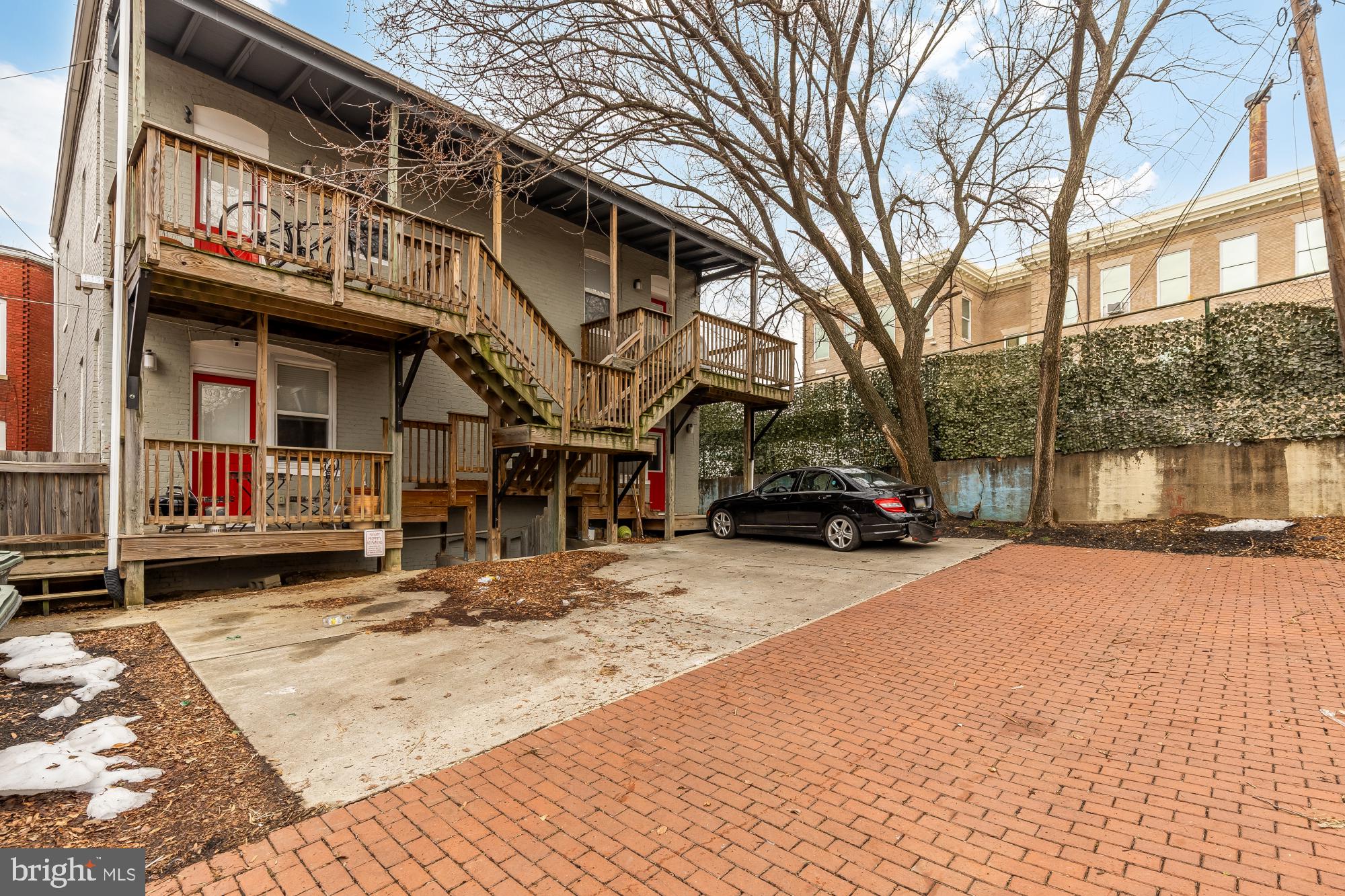 1719 Lincoln Road Northeast, Unit 1 Washington, DC 20002 - Photo 22 of 23 a view of a building with car parked