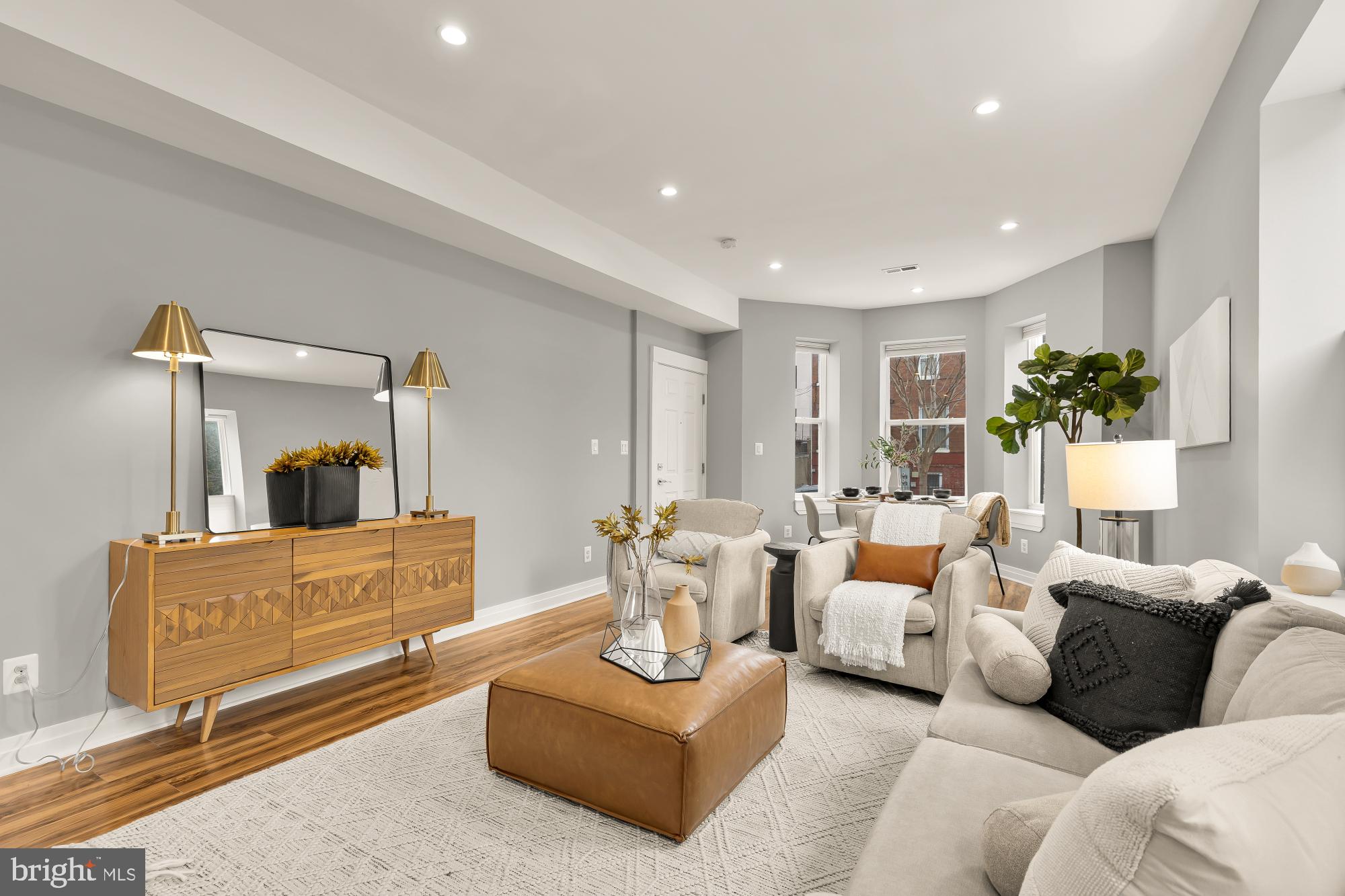 1719 Lincoln Road Northeast, Unit 1 Washington, DC 20002 - Photo 5 of 23 a living room with furniture and a wooden floor