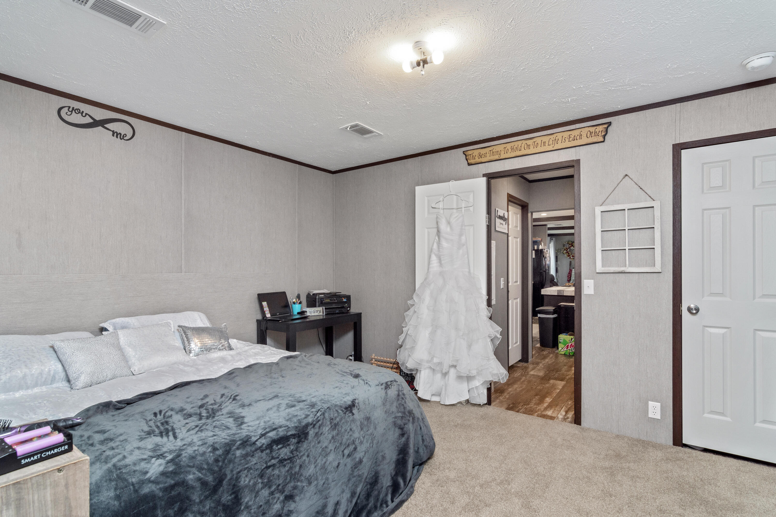 3934 Chambray Road Crestview, FL 32539 - Photo 14 of 24 a bedroom with a bed and a table