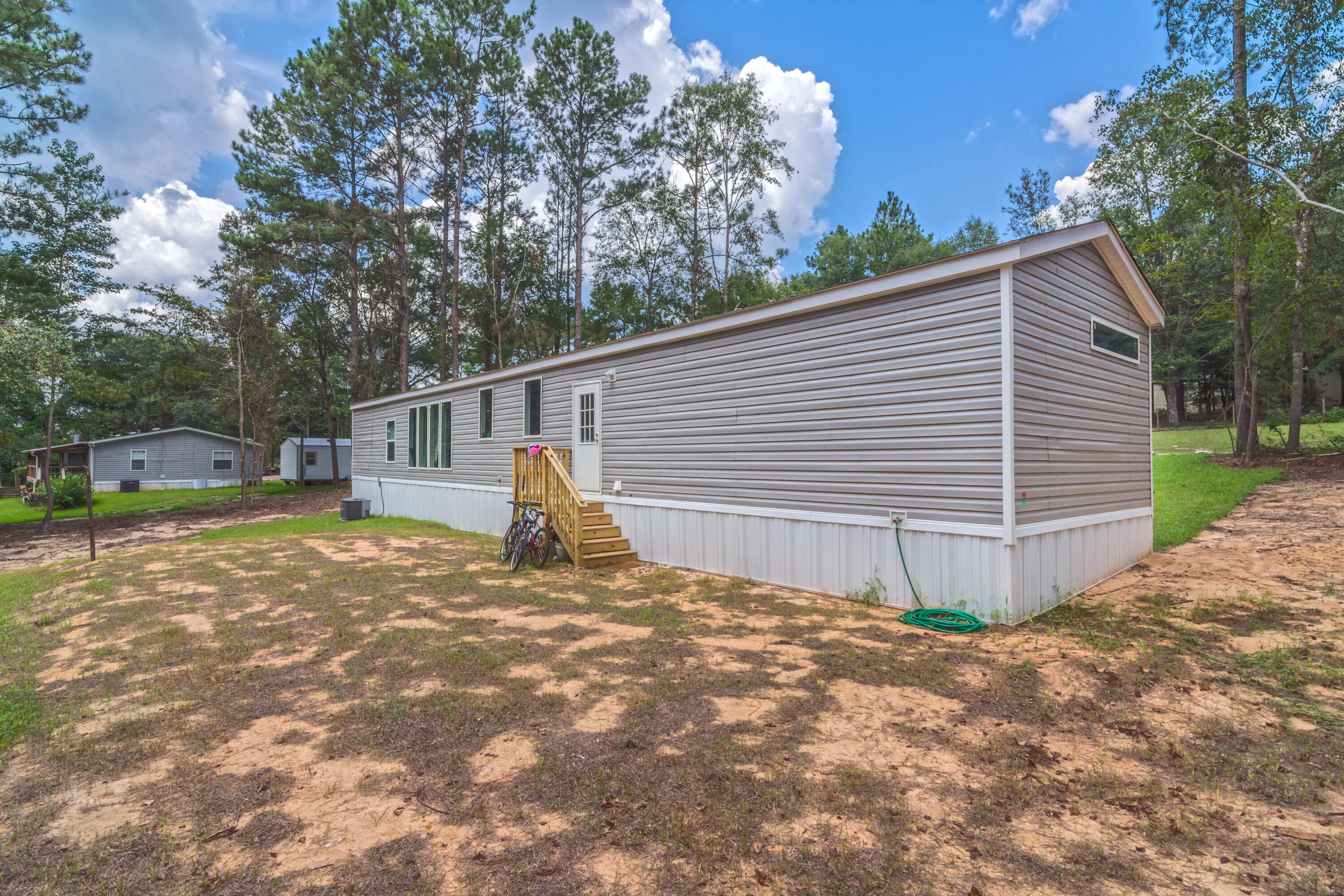 3934 Chambray Road Crestview, FL 32539 - Photo 24 of 24 a view of a house with a yard