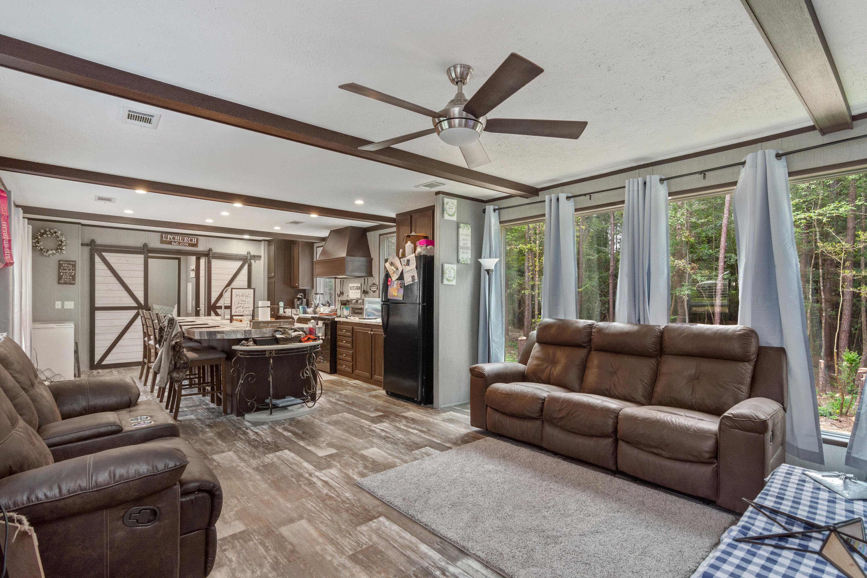 3934 Chambray Road Crestview, FL 32539 - Photo 4 of 24 a living room with furniture and a large window