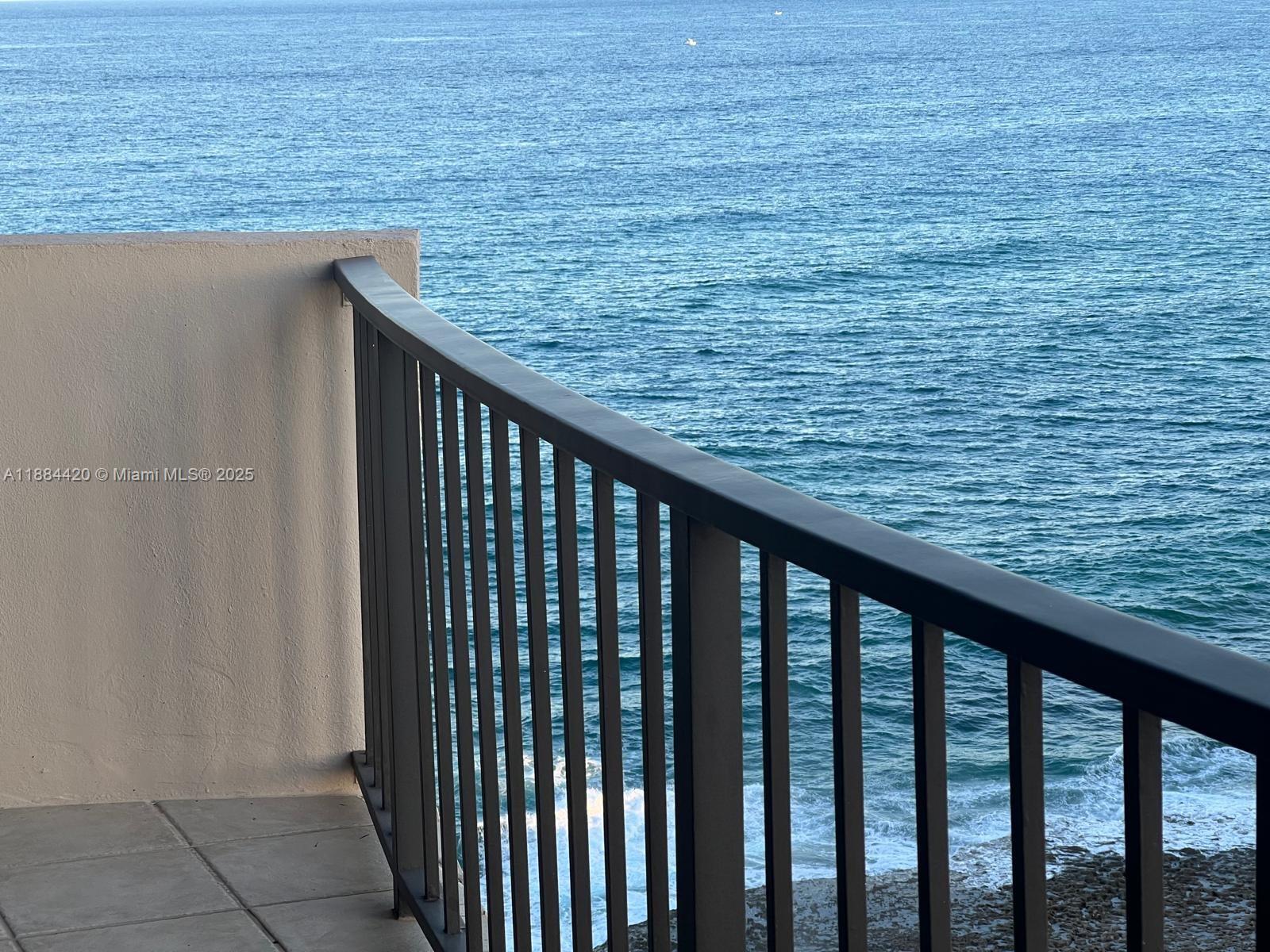 4200 North Ocean Drive, Unit 11103 Riviera Beach, FL 33404 - Photo 5 of 11 a view of wooden balcony with outdoor space