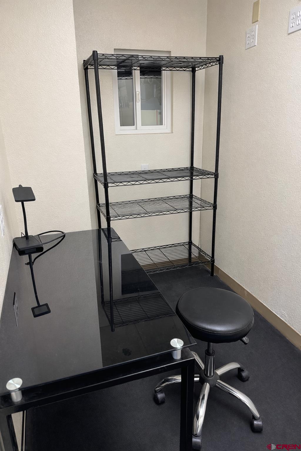 239 North 9th Street, Unit FIRST Montrose, CO 81401 - Photo 4 of 4 a view of entryway with wooden floor