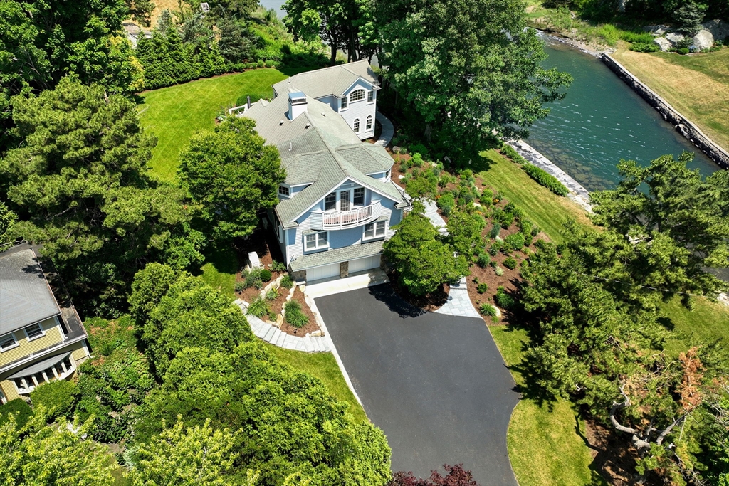 20 Nichols Road Cohasset, MA 02025 - Photo 40 of 42 an aerial view of a house with a yard and garden