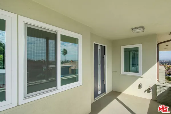 a view of a backyard with a deck