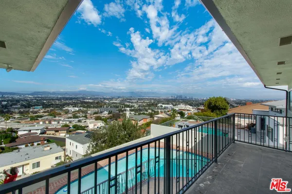 a balcony with an ocean view