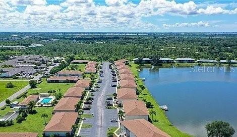 25275 Rampart Boulevard, Unit 1605 Punta Gorda, FL 33983 - Photo 1 of 16 a view of a city and lake