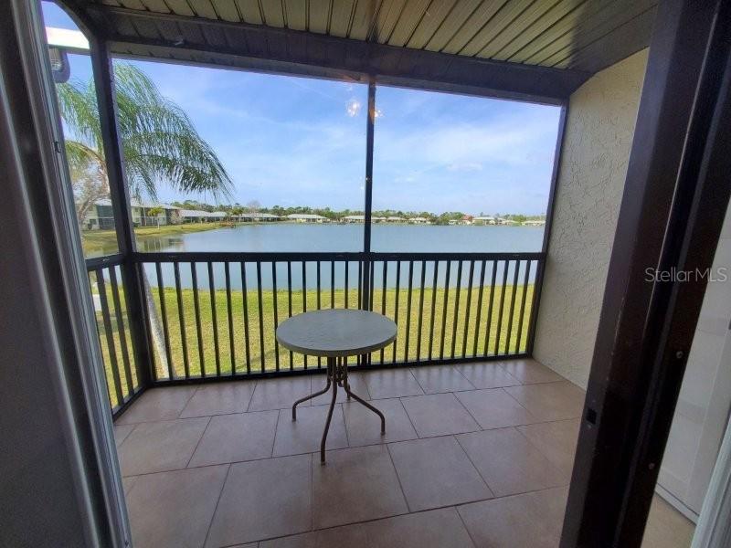 25275 Rampart Boulevard, Unit 1605 Punta Gorda, FL 33983 - Photo 4 of 16 a view of a balcony with furniture