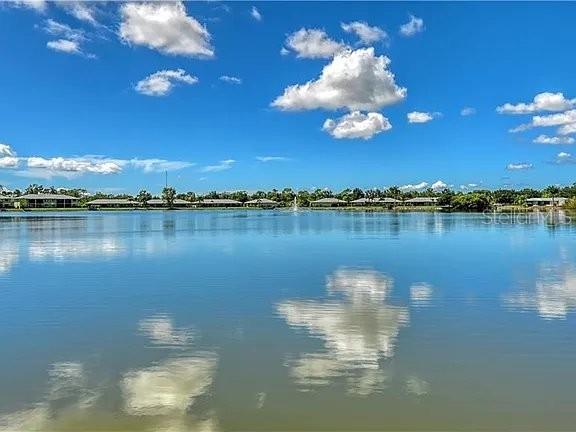 25275 Rampart Boulevard, Unit 1605 Punta Gorda, FL 33983 - Photo 5 of 16 a view of a lake with outdoor space