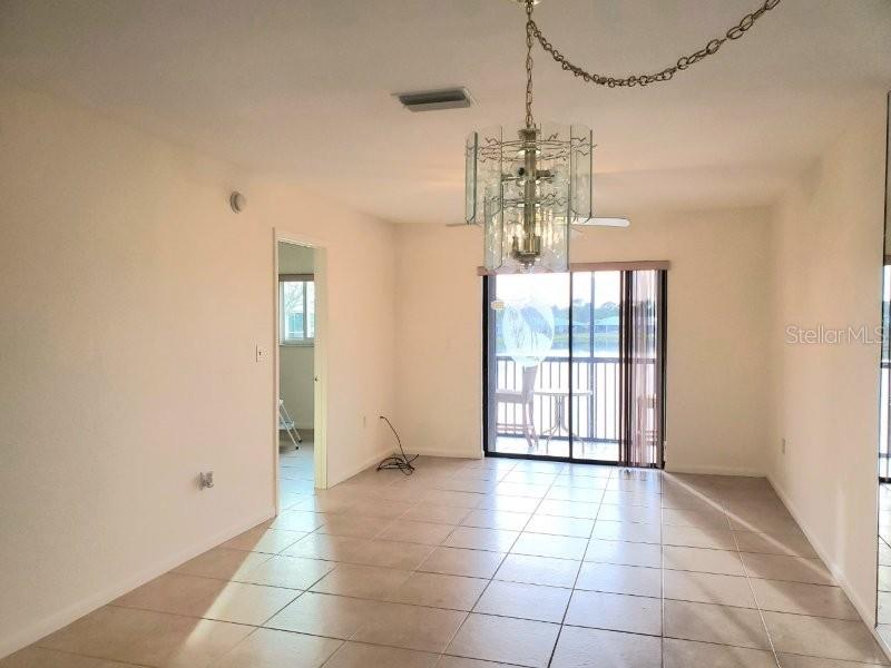 25275 Rampart Boulevard, Unit 1605 Punta Gorda, FL 33983 - Photo 7 of 16 a view of an empty room with a window