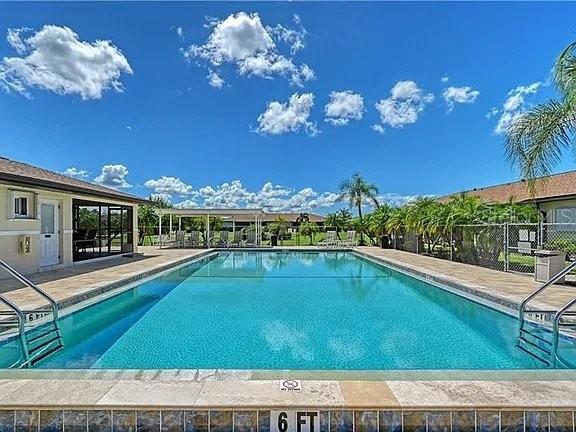 25275 Rampart Boulevard, Unit 1605 Punta Gorda, FL 33983 - Photo 9 of 16 a view of a swimming pool with seating space