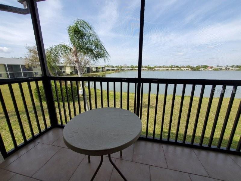 25275 Rampart Boulevard, Unit 1605 Punta Gorda, FL 33983 - Photo 10 of 16 a view of a balcony with furniture