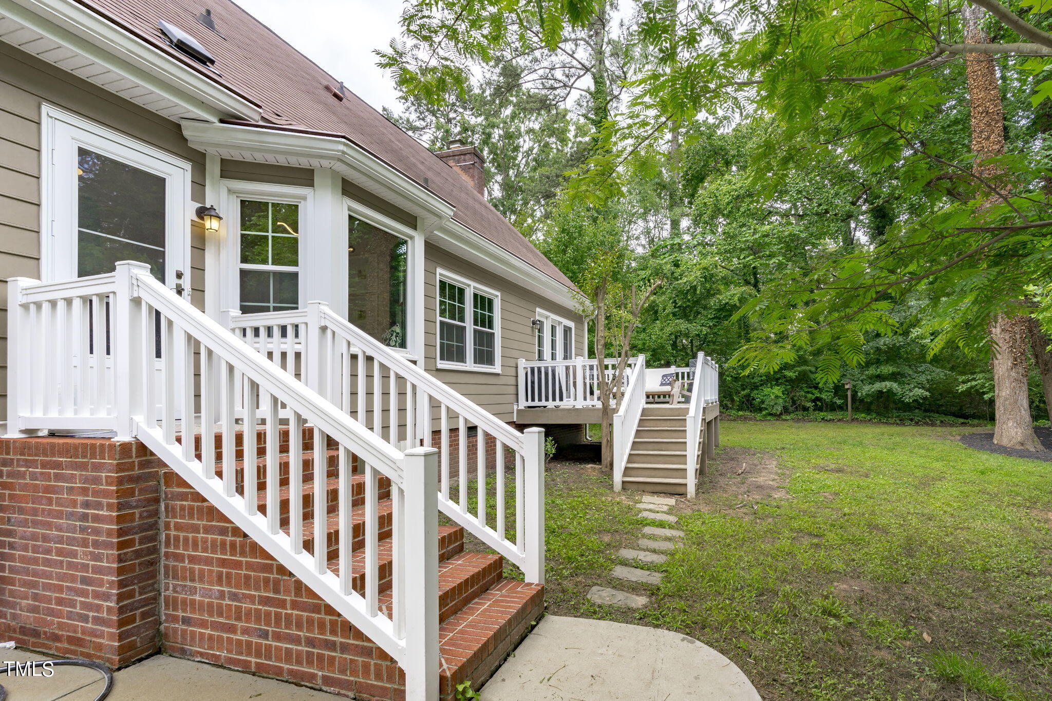 5701 Setter Circle Raleigh, NC 27609 - Photo 35 of 39 STEPS FROM DECK AND KITCHEN STOOP