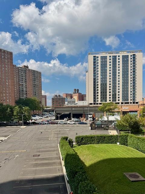 a view of a swimming pool and a yard