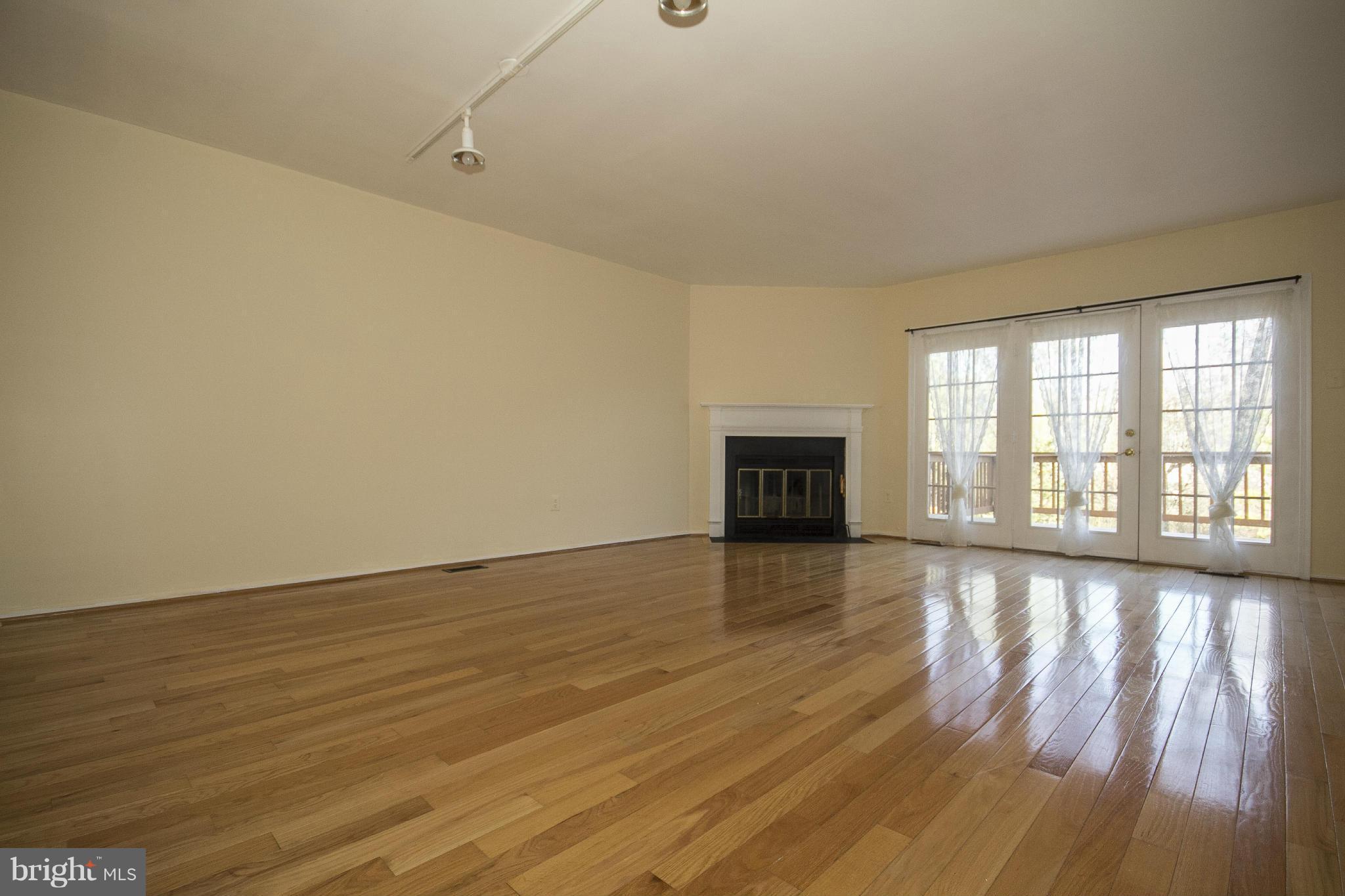 3932 Forest Valley Road Baltimore, MD 21234 - Photo 10 of 30 Living Room w/wood burning fireplace