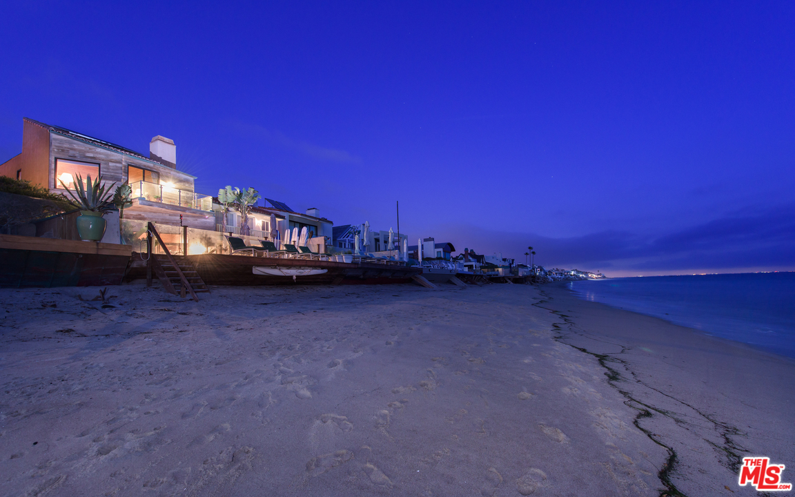 23768 Malibu Road Malibu, CA 90265 - Photo 1 of 23 a view of a house with a yard