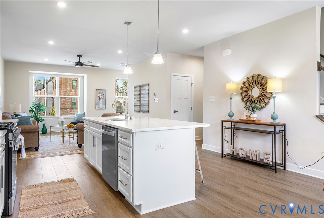 1255 Lazy River Road Midlothian, VA 23114 - Photo 27 of 27 a kitchen with a stove a sink and a refrigerator