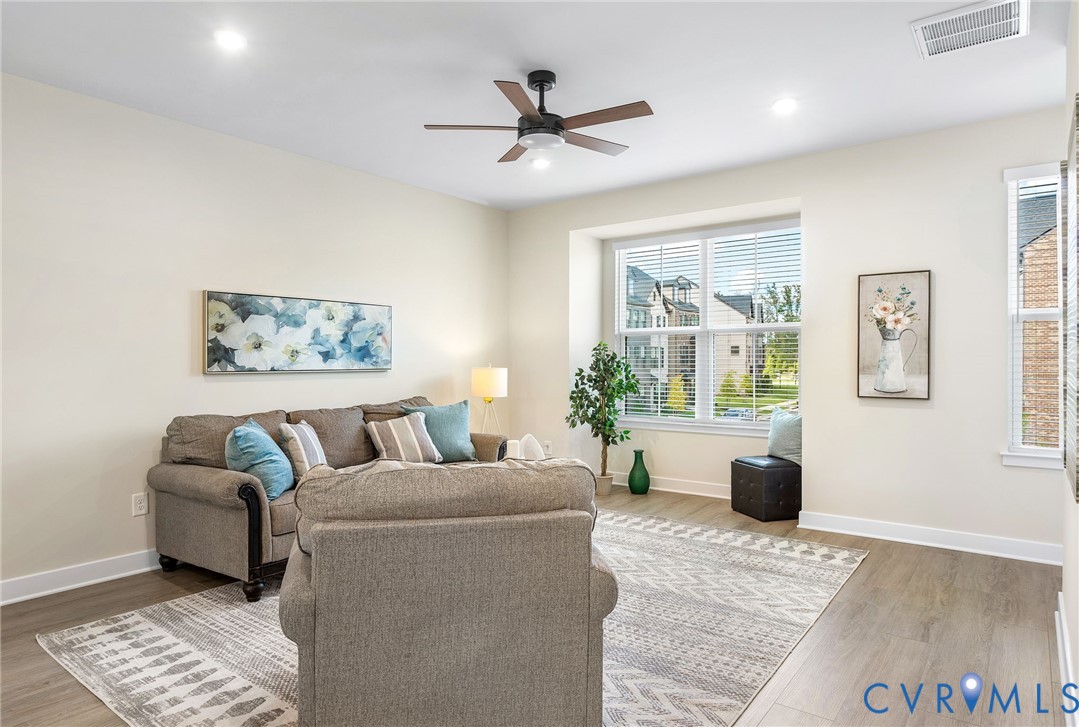1255 Lazy River Road Midlothian, VA 23114 - Photo 7 of 27 a living room with furniture and a window