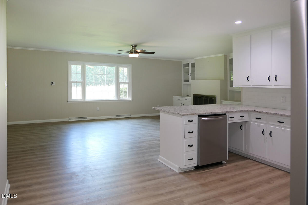 1075 Manns Chapel Road Pittsboro, NC 27312 - Photo 17 of 33 q Kitchen 1 to FR