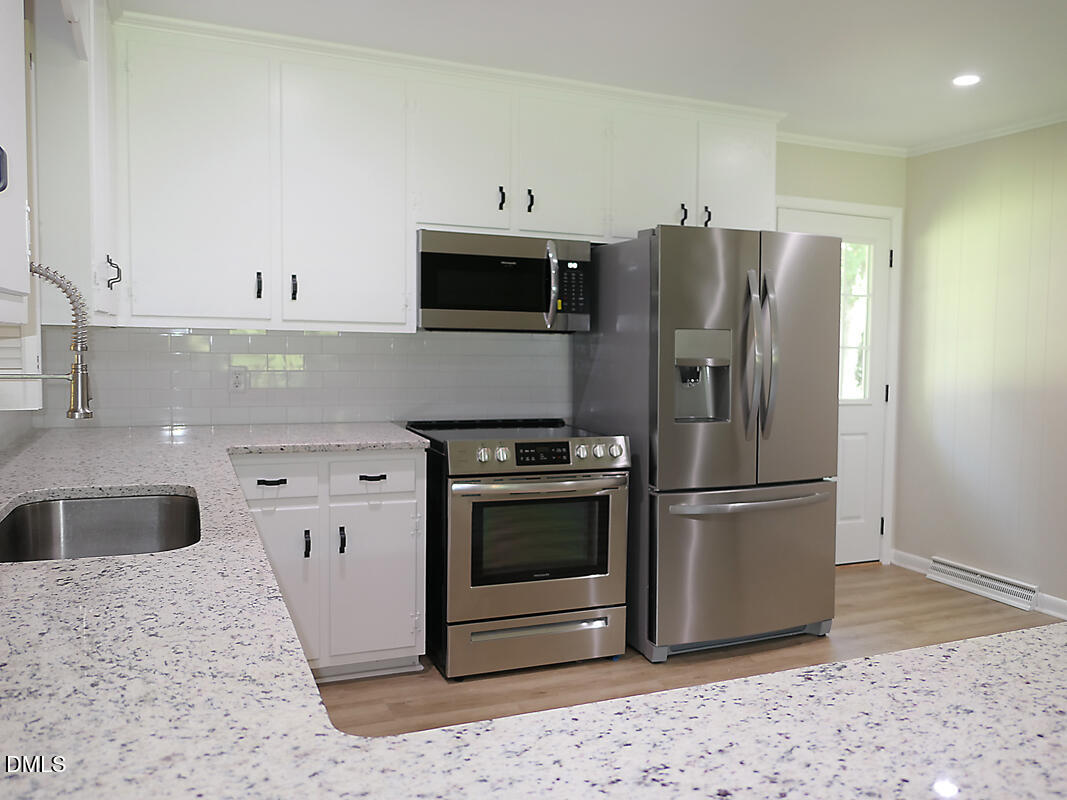 1075 Manns Chapel Road Pittsboro, NC 27312 - Photo 18 of 33 r kitchen 2