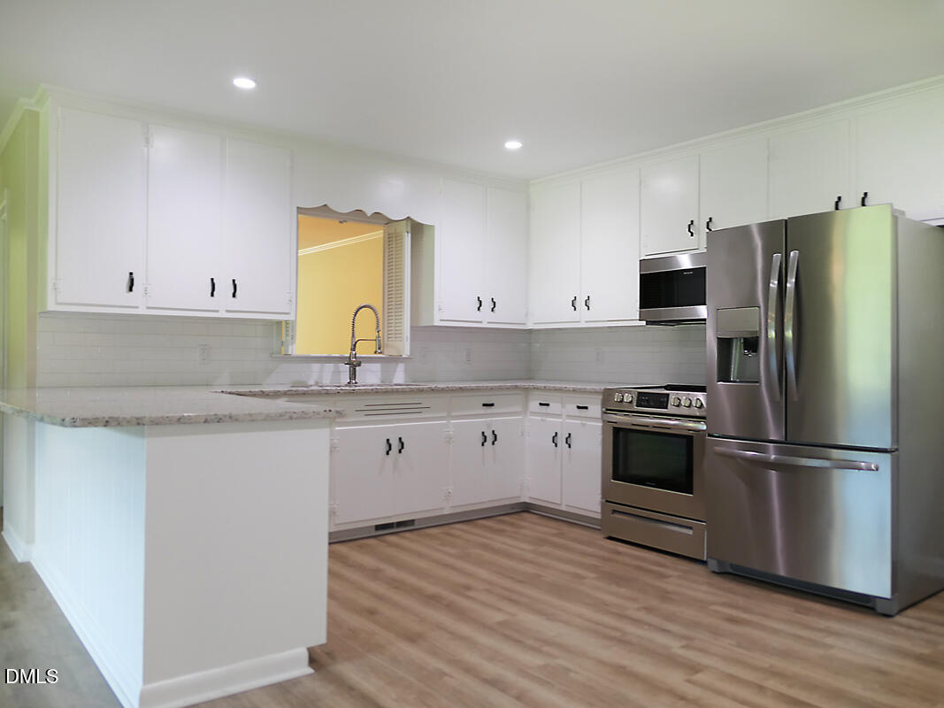 1075 Manns Chapel Road Pittsboro, NC 27312 - Photo 19 of 33 s kitchen 3