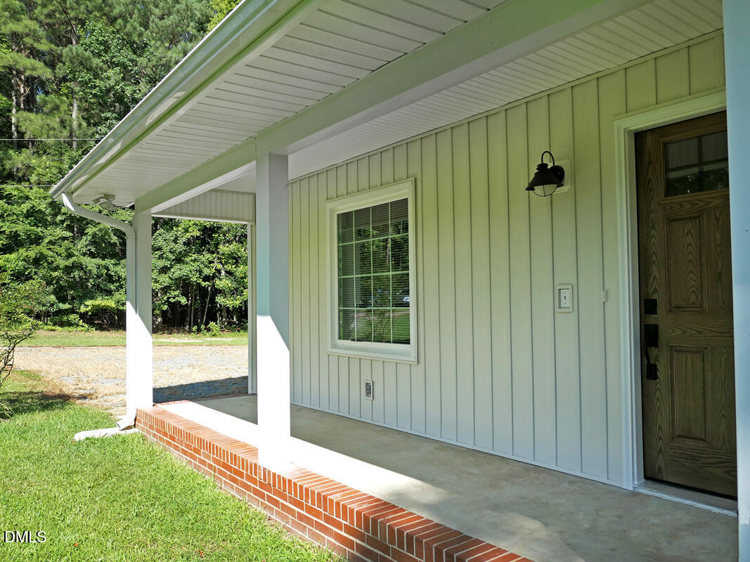1075 Manns Chapel Road Pittsboro, NC 27312 - Photo 3 of 33 c Porch 1