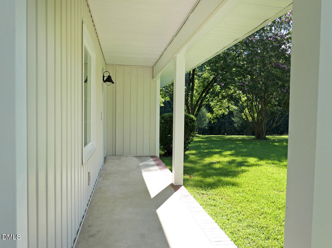 1075 Manns Chapel Road Pittsboro, NC 27312 - Photo 4 of 33 d porch 2