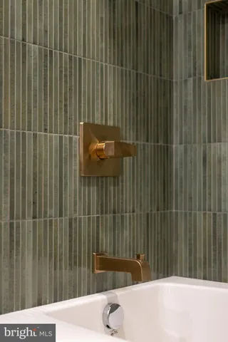 a view of a house with backyard and porch