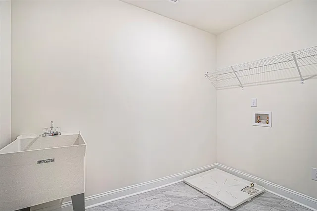 a view of a house with porch and wooden floor