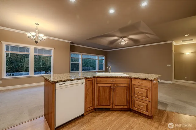 a spacious bathroom with a sink and a large mirror