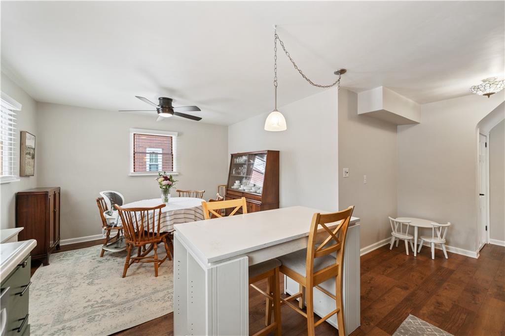 315 Vanadium Road Pittsburgh, PA 15243 - Photo 12 of 39 a view of a dining room with furniture and wooden floor